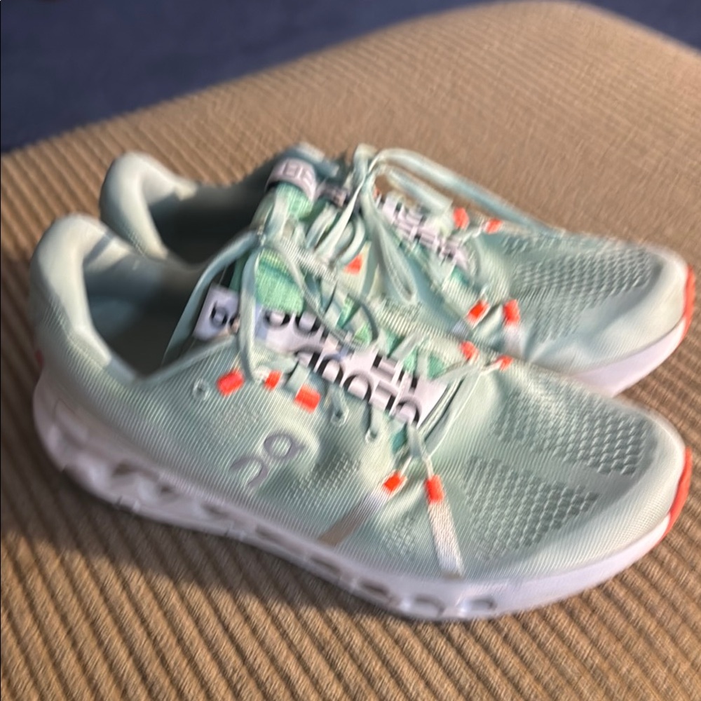 On Running Light Green and Orange Sneakers
